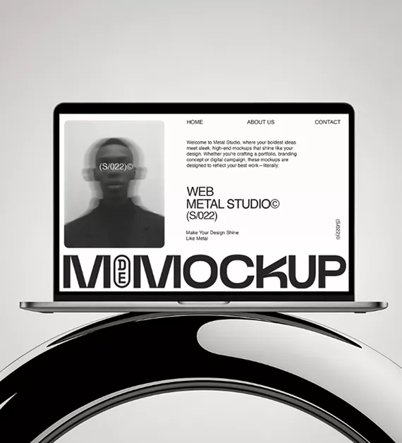 Laptop displaying Metal Studio website mockup with minimalist black and white design on modern curved surface with "MOCKUP" text prominently shown